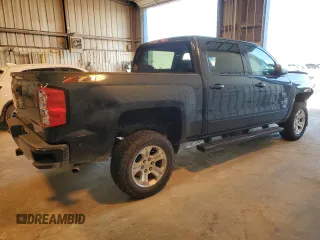 2018 Chevrolet Silverado 1500 LT with VIN 3GCUKRECXJG283331, listed as a Copart auction lot 52102345 with 69,603 mi miles and Salvage Title. Bid and sale history available at DreamBid. Image 3.