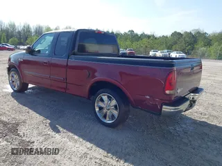 2003 Ford F-150 XL with VIN 1FTRX17W93NA39048, listed as a IAAI auction lot 41918798 with 237,303 mi miles. Bid and sale history available at carsss.com. Image 3.
