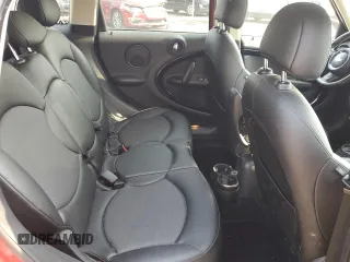 2015 MINI Countryman S z VIN WMWZC5C56FWP47625, wystawiony jako Copart lot #59610185 z przebiegiem 136 096 mil mil oraz Czysty tytuł • Clean title. Historia ofert i sprzedaży dostępna na DreamBid. Obrazek 10.