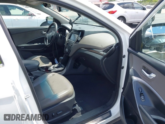 2017 Hyundai Santa Fe 2.4L z VIN 5NMZU3LB9HH034850, wystawiony jako IAAI lot #42342054 z przebiegiem 192 154 mil mil oraz . Historia ofert i sprzedaży dostępna na DreamBid. Obrazek 5.