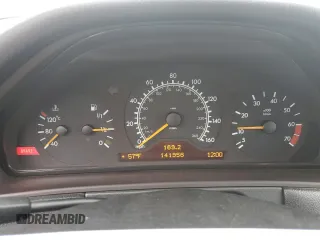 1999 Mercedes-Benz E-Class with VIN WDBJF65H5XA906877, listed as a Copart auction lot 76156014 with 141,956 mi miles and Clean Title. Bid and sale history available at carsss.com. Image 9.