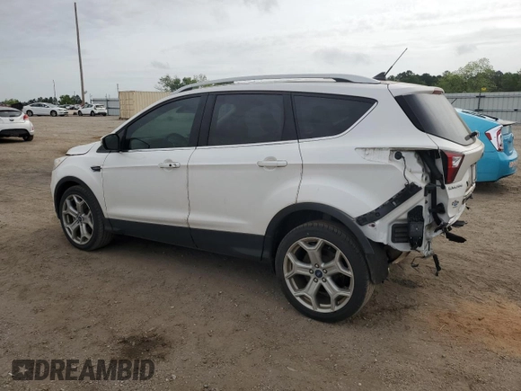 2019 Ford Escape Titanium with VIN 1FMCU0J91KUB19987, listed as a Copart auction lot 53946025 with 90,092 mi miles and Salvage title. Bid and sale history available at DreamBid. Image 2.