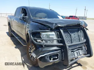 2017 Nissan Titan Pro-4X z VIN 1N6BA1F42HN544405, wystawiony jako IAAI lot #41992156 z przebiegiem 123 441 mil mil oraz . Historia ofert i sprzedaży dostępna na DreamBid. Obrazek 1.