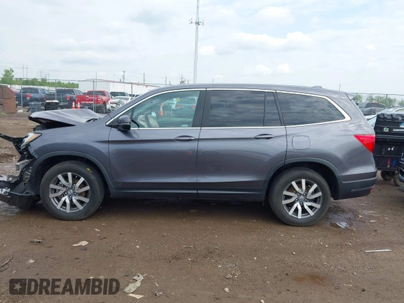 2019 Honda Pilot EX-L with VIN 5FNYF6H57KB053786, listed as a IAAI auction lot 42161832 with 89,326 mi miles and . Bid and sale history available at carsss.com. Image 14.