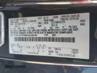 2013 Ford Escape SE with VIN 1FMCU0GX8DUA38056, listed as a Copart auction lot 57617885 with 128,467 mi miles and Salvage title. Bid and sale history available at DreamBid. Image 13.