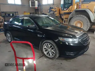 2015 Ford Taurus Limited with VIN 1FAHP2J87FG172580, listed as a IAAI auction lot 41891567 with 183,784 mi miles. Bid and sale history available at carsss.com. Image 1.