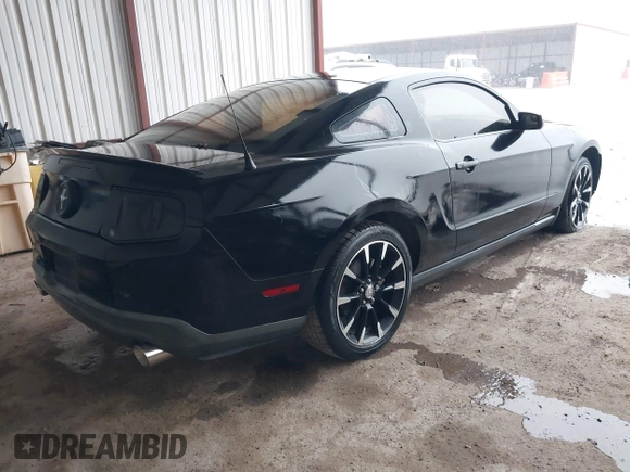 2012 Ford Mustang V6 Premium with VIN 1ZVBP8AM5C5223787, listed as a IAAI auction lot 42141944 with 73,960 mi miles. Bid and sale history available at carsss.com. Image 4.