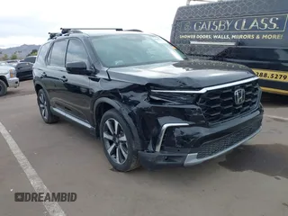2024 Honda Pilot Touring z VIN 5FNYG1H70RB032368, wystawiony jako IAAI lot #41805758 z przebiegiem 13 078 mil mil oraz . Historia ofert i sprzedaży dostępna na DreamBid. Obrazek 1.