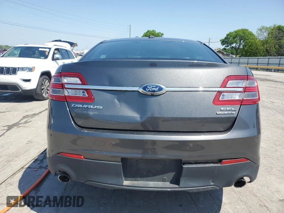 2015 Ford Taurus SEL z VIN 1FAHP2E83FG125234, wystawiony jako Copart lot #54404745 z przebiegiem 107 311 mil mil oraz Szkody całkowita. Historia ofert i sprzedaży dostępna na DreamBid. Obrazek 6.