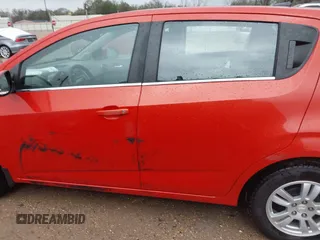 2013 Chevrolet Sonic LT with VIN 1G1JC6SHXD4139822, listed as a IAAI auction lot 41672289 with 87,899 mi miles. Bid and sale history available at carsss.com. Image 14.