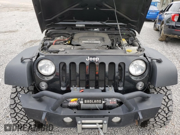 2014 Jeep Wrangler Sport with VIN 1C4AJWAG5EL326480, listed as a Copart auction lot 60653955 with 94,102 mi miles and Salvage title. Bid and sale history available at DreamBid. Image 11.