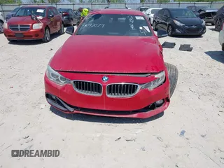 2014 BMW 4 Series 428i xDrive with VIN WBA3T1C56EPS98728, listed as a IAAI auction lot 42092079 with 102,856 mi miles and . Bid and sale history available at carsss.com. Image 6.