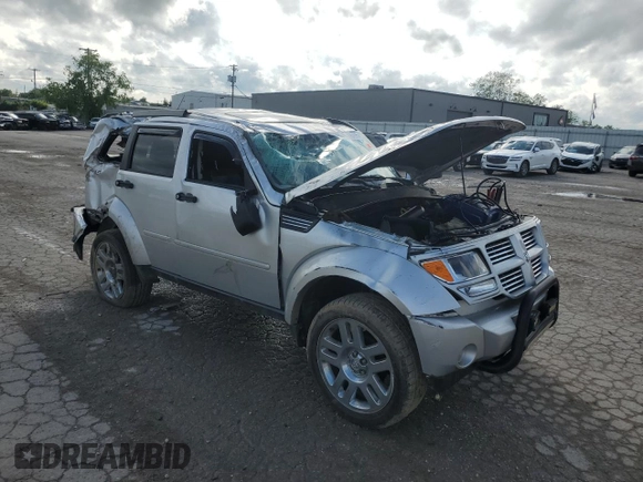 2010 Dodge Nitro Heat with VIN 1D4PU4GK2AW170976, listed as a Copart auction lot 57406765 with 213,121 mi miles and Salvage title. Bid and sale history available at DreamBid. Image 4.