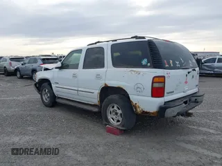 2003 GMC Yukon SLT with VIN 1GKEK13V23J300767, listed as a IAAI auction lot 41691632 with 251,849 mi miles. Bid and sale history available at carsss.com. Image 3.