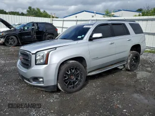 2015 GMC Yukon SLT with VIN 1GKS2BKC9FR518381, listed as a Copart auction lot 66352864 with 103,419 mi miles and Salvage Title. Bid and sale history available at carsss.com. Image 1.