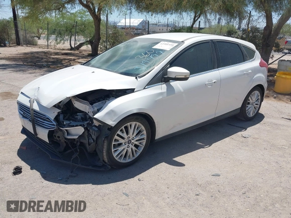 2016 Ford Focus Titanium with VIN 1FADP3N27GL319497, listed as a IAAI auction lot 42385359 with Not provided miles and . Bid and sale history available at DreamBid. Image 2.