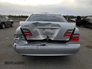 2000 Mercedes-Benz E-Class with VIN WDBJF65J8YB153103, listed as a Copart auction lot 80986234 with 144,205 mi miles and Salvage Title. Bid and sale history available at carsss.com. Image 6.