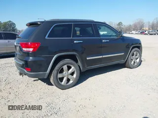 2013 Jeep Grand Cherokee Overland with VIN 1C4RJECG7DC644822, listed as a IAAI auction lot 41658872 with 156,838 mi miles. Bid and sale history available at carsss.com. Image 4.