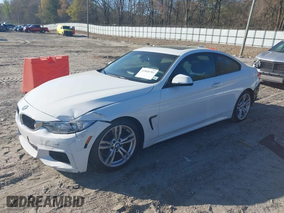 2014 BMW 4 Series 428i with VIN WBA3N3C53EF712057, listed as a IAAI auction lot 41868781 with 133,834 mi miles and . Bid and sale history available at DreamBid. Image 2.