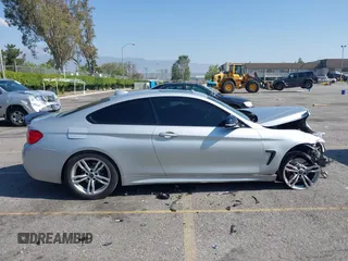 2014 BMW 4 Series 428i xDrive with VIN WBA3N9C54EF721188, listed as a IAAI auction lot 42143305 with Not provided miles and . Bid and sale history available at DreamBid. Image 12.