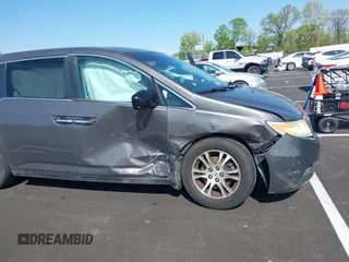 2011 Honda Odyssey EX-L with VIN 5FNRL5H62BB058765, listed as a IAAI auction lot 42017802 with 178,512 mi miles and . Bid and sale history available at carsss.com. Image 6.