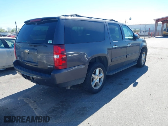 2011 Chevrolet Suburban LT with VIN 1GNSCJE03BR255374, listed as a IAAI auction lot 41826513 with 279,698 mi miles. Bid and sale history available at carsss.com. Image 4.