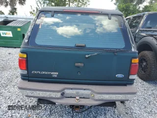 1996 Ford Explorer XLT z VIN 1FMDU32P0TZA75326, wystawiony jako Copart lot #43005845 z przebiegiem 67 286 mil mil oraz Szkody całkowita. Historia ofert i sprzedaży dostępna na DreamBid. Obrazek 6.