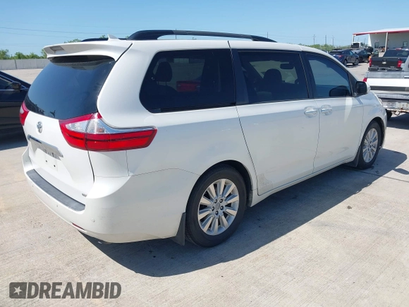 2015 Toyota Sienna XLE with VIN 5TDYK3DC8FS666113, listed as a IAAI auction lot 41999037 with 179,566 mi miles and . Bid and sale history available at carsss.com. Image 4.