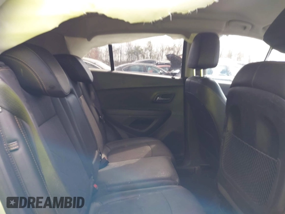 2020 Chevrolet Trax LT with VIN 3GNCJLSBXLL310309, listed as a IAAI auction lot 41893367 with 93,418 mi miles and . Bid and sale history available at DreamBid. Image 8.