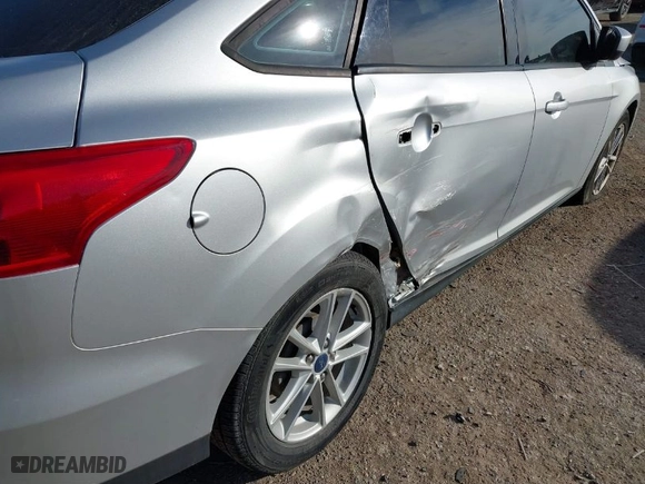 2018 Ford Focus SE with VIN 1FADP3F28JL292946, listed as a IAAI auction lot 41435501 with 111,251 mi miles. Bid and sale history available at carsss.com. Image 6.