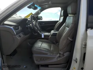 2015 Chevrolet Tahoe LTZ with VIN 1GNSCCKCXFR102314, listed as a Copart auction lot 48479825 with 218,901 mi miles and Salvage Title. Bid and sale history available at carsss.com. Image 7.