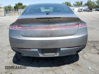 2015 Lincoln MKZ Hybrid z VIN 3LN6L2LU3FR608806, wystawiony jako Copart lot #57187835 z przebiegiem 151 462 mil mil oraz Czysty tytuł • Clean title. Historia ofert i sprzedaży dostępna na DreamBid. Obrazek 6.