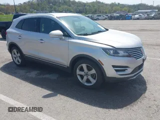 2015 Lincoln MKC with VIN 5LMCJ2A94FUJ16038, listed as a IAAI auction lot 42057400 with 102,848 mi miles. Bid and sale history available at carsss.com. Image 1.