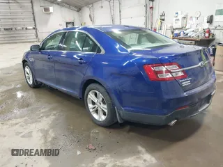 2013 Ford Taurus SEL with VIN 1FAHP2E82DG149828, listed as a IAAI auction lot 41910513 with 130,594 mi miles and . Bid and sale history available at carsss.com. Image 3.