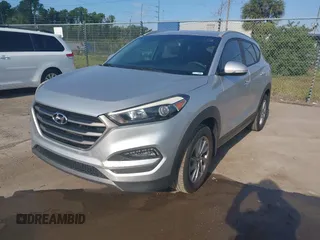 2016 Hyundai Tucson Limited with VIN KM8J33A25GU227907, listed as a IAAI auction lot 42211605 with 142,578 mi miles. Bid and sale history available at carsss.com. Image 2.