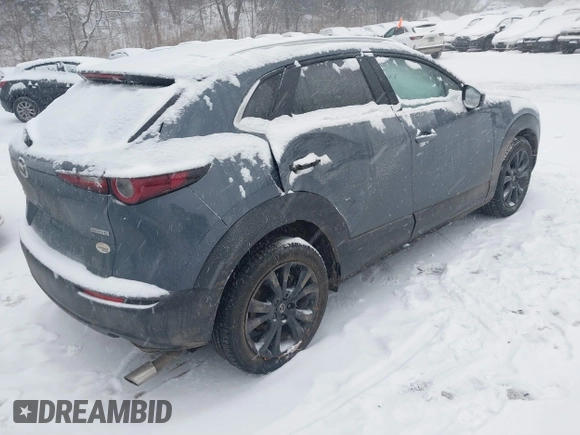 2023 Mazda CX-30 S Preferred z VIN 3MVDMBCM4PM574509, wystawiony jako IAAI lot #41522283 z przebiegiem 21 507 mil mil oraz . Historia ofert i sprzedaży dostępna na DreamBid. Obrazek 4.