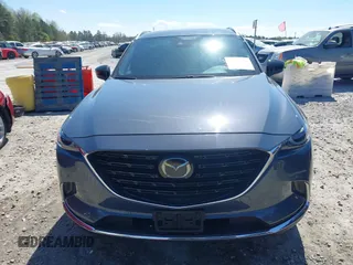 2021 Mazda CX-9 Carbon Edition with VIN JM3TCADY9M0517174, listed as a IAAI auction lot 41871485 with 48,484 mi miles and . Bid and sale history available at DreamBid. Image 13.