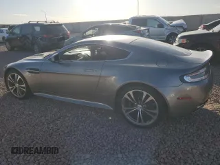 2011 Aston Martin V12 Vantage Carbon Black with VIN SCFEBBCF4BGS00791, listed as a Copart auction lot 76911374 with 8,207 mi miles and Salvage Title. Bid and sale history available at carsss.com. Image 2.