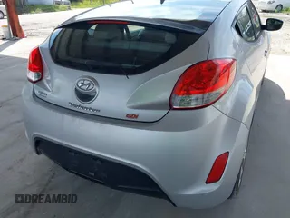 2012 Hyundai Veloster w/Gray Int z VIN KMHTC6ADXCU056898, wystawiony jako IAAI lot #40366687 z przebiegiem 137 161 mil mil oraz . Historia ofert i sprzedaży dostępna na DreamBid. Obrazek 13.