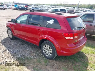 2016 Dodge Journey SE with VIN 3C4PDCAB7GT250093, listed as a IAAI auction lot 42061392 with 100,433 mi miles. Bid and sale history available at carsss.com. Image 3.