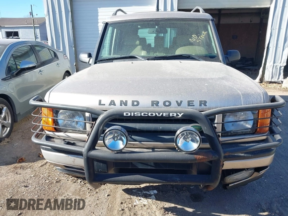 2000 Land Rover Discovery Cloth z VIN SALTY1247YA249969, wystawiony jako IAAI lot #41035905 z przebiegiem 188 643 mil mil oraz . Historia ofert i sprzedaży dostępna na DreamBid. Obrazek 6.