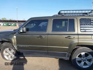2016 Jeep Patriot High Altitude Edition with VIN 1C4NJRFB4GD581179, listed as a IAAI auction lot 42101912 with 168,254 mi miles. Bid and sale history available at carsss.com. Image 14.