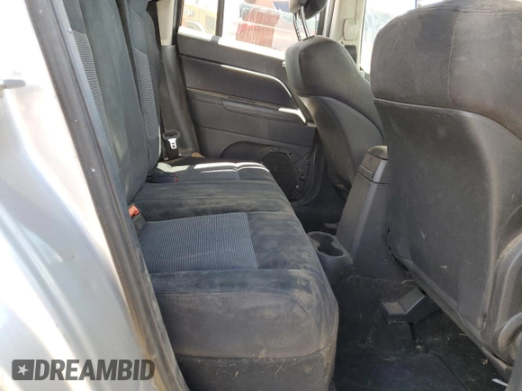 2013 Jeep Patriot Latitude z VIN 1C4NJRFB6DD192250, wystawiony jako Copart lot #54366235 z przebiegiem 111 817 mil mil oraz Szkoda całkowita • Salvage title. Historia ofert i sprzedaży dostępna na DreamBid. Obrazek 11.