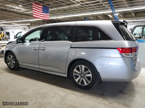 2016 Honda Odyssey Touring Elite with VIN 5FNRL5H97GB012933, listed as a Copart auction lot 48786975 with 117,583 mi miles and Salvage Title. Bid and sale history available at carsss.com. Image 2.