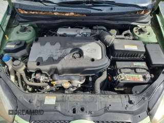 2007 Hyundai Accent SE z VIN KMHCN36C07U035170, wystawiony jako Copart lot #58201395 z przebiegiem 154 388 mil mil oraz Szkoda całkowita • Salvage title. Historia ofert i sprzedaży dostępna na DreamBid. Obrazek 11.