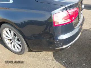 2011 Audi A8 with VIN WAURVAFD4BN018884, listed as a IAAI auction lot 42693000 with 116,952 mi miles and . Bid and sale history available at DreamBid. Image 13.