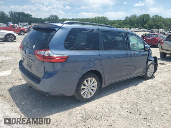 2015 Toyota Sienna LE with VIN 5TDJK3DC4FS107711, listed as a Copart auction lot 57693005 with 141,370 mi miles and Salvage title. Bid and sale history available at DreamBid. Image 3.