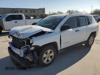 2014 Jeep Compass Sport with VIN 1C4NJCBA1ED717520, listed as a Copart auction lot 88745365 with 75,295 mi miles and Salvage Title. Bid and sale history available at carsss.com. Image 1.