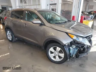 2012 Kia Sportage LX with VIN KNDPB3A23C7317650, listed as a IAAI auction lot 41631193 with 96,433 mi miles. Bid and sale history available at carsss.com. Image 1.