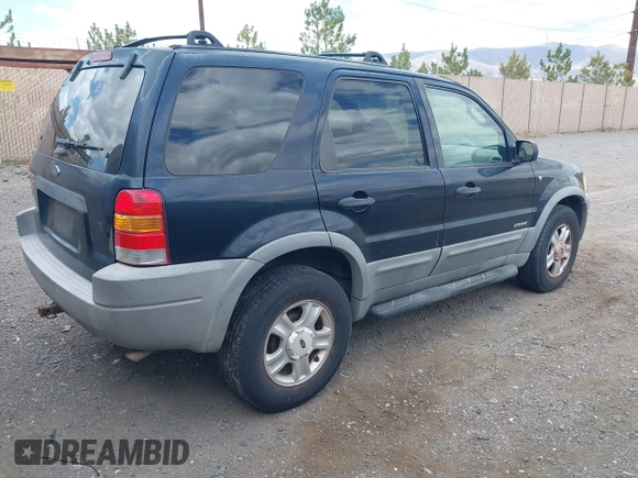 2001 Ford Escape XLT with VIN 1FMCU041X1KA93910, listed as a IAAI auction lot 42270271 with 151,166 mi miles and . Bid and sale history available at DreamBid. Image 4.